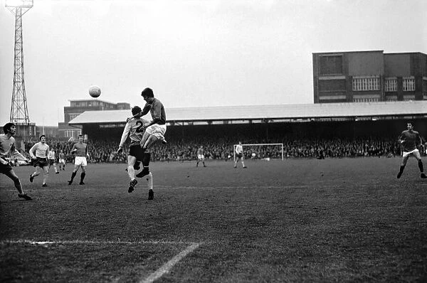 Hill head goalwards, Hughes is next to him. December 1969 Z12046-003