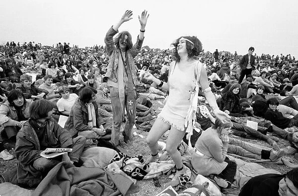 Hippy couple dancing at The Isle of Wight Festival. 30th August 1969