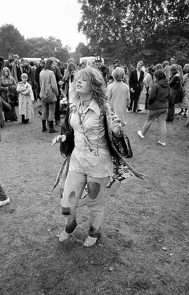 Hippy girl dancing at Free Hyde Park Pop Festival featuring Canned Heat