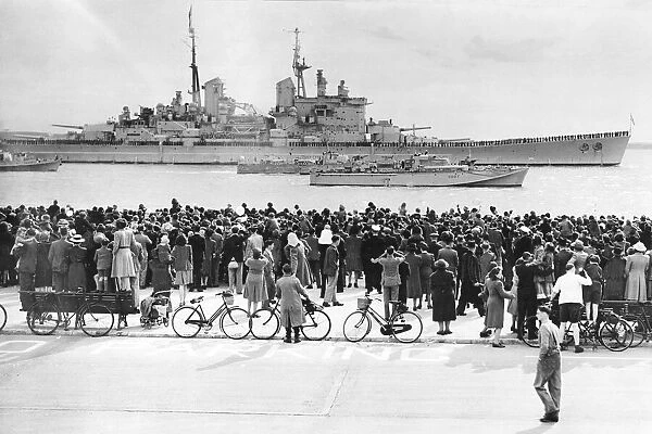 HMS Vanguard which took the Royal Family on their tour of South Africa is escorted back