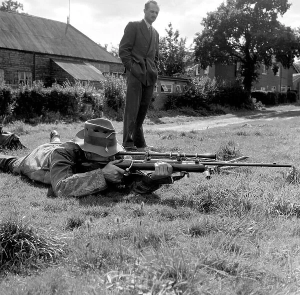 Hobbies: Man firing rifle at the Surrey rifle range. August 1953 D5342