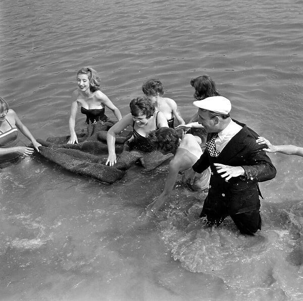 Holiday makers swimming at Ruislip Lido. 1st July 1960