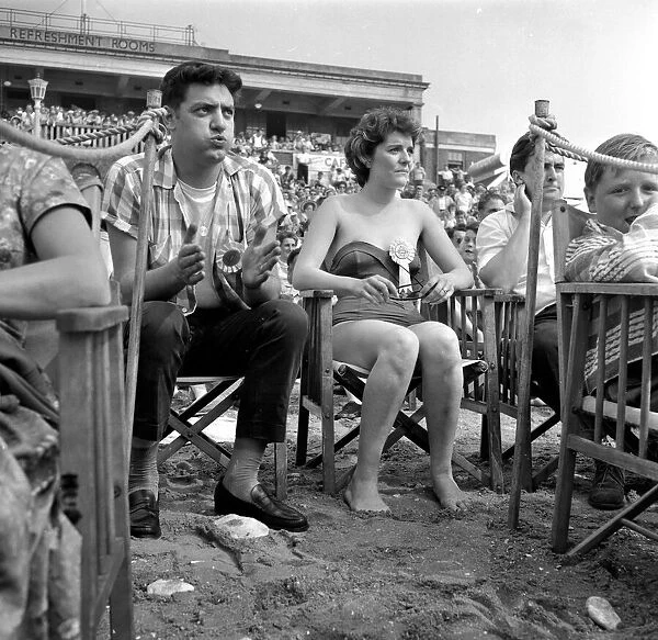 Holiday makers watching the Sunday Mirror Beauty contest girls at Hunstanton, UK