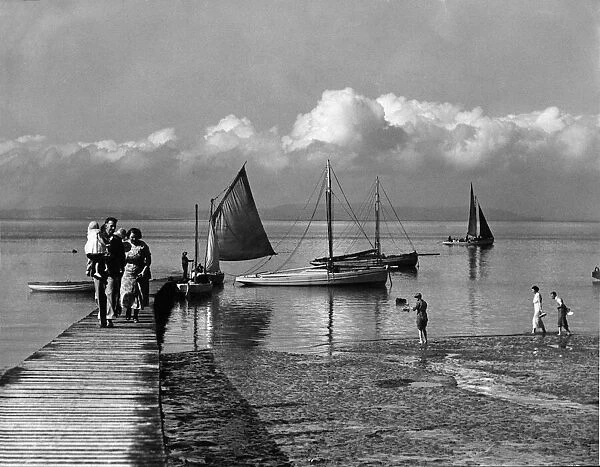 Holiday at Morecombe - Picture taken yesterday of holiday makers returning from a sail in