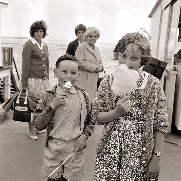 Holiday Resorts at Southend in Essex Two Young children eating a icecream