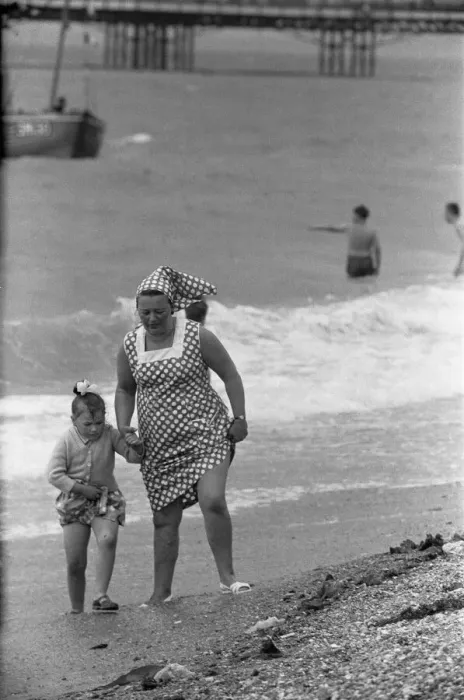 Framed Print : Holiday scenes at Brighton Mother and daughter paddling in the English channel Framed Print : Holiday scenes at Brighton Mother and daughter paddling in the English channel
