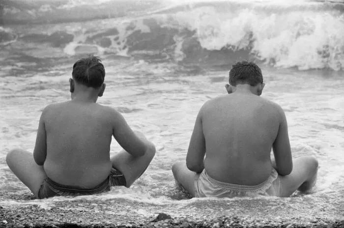 Framed Print : Holiday scenes at Brighton To young boys sitting in the sea to cool off during Framed Print : Holiday scenes at Brighton To young boys sitting in the sea to cool off during