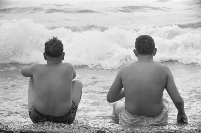 Framed Print : Holiday scenes at Brighton To young boys sitting in the sea to cool off during Framed Print : Holiday scenes at Brighton To young boys sitting in the sea to cool off during