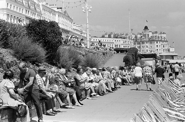 Holidaymakers enjoying themselves at Eastbourne, East Sussex, during the summer of 1976