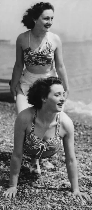Framed Print : Holidaymakers play a wheelbarrow race on the pebble beach at Hastings May 1947 Framed Print : Holidaymakers play a wheelbarrow race on the pebble beach at Hastings May 1947