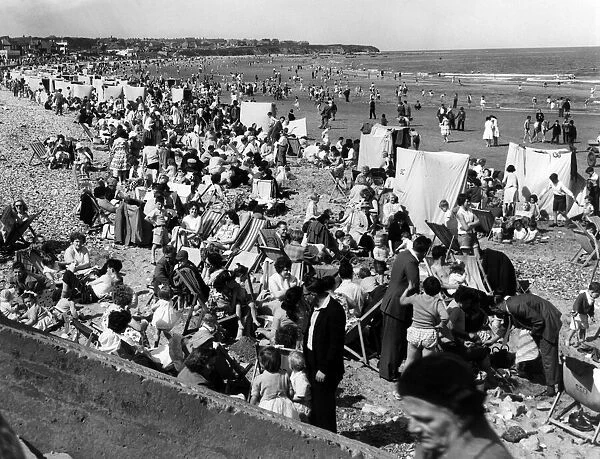 Holidaymakers on Saltburn Beach. 31st May 1960