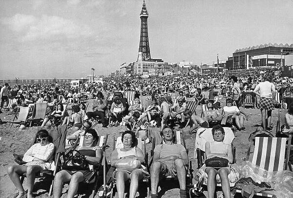 Holidaymakers sunbathing on Blackpool beach Blackpool Tower August 1972