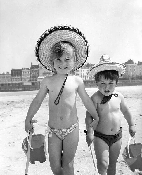 Holidays children: On the beach at Margate, Kent complete with buckets