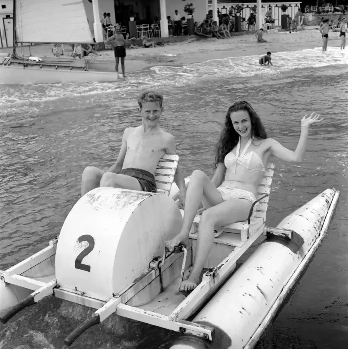Framed Print : Holidays: Couple riding on a pedalo off the coast of Corsica. August 1957 Framed Print : Holidays: Couple riding on a pedalo off the coast of Corsica. August 1957