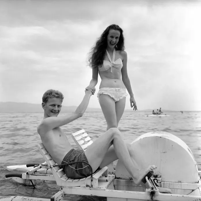 Framed Print : Holidays: Couple riding on a pedalo off the coast of Corsica. August 1957 Framed Print : Holidays: Couple riding on a pedalo off the coast of Corsica. August 1957
