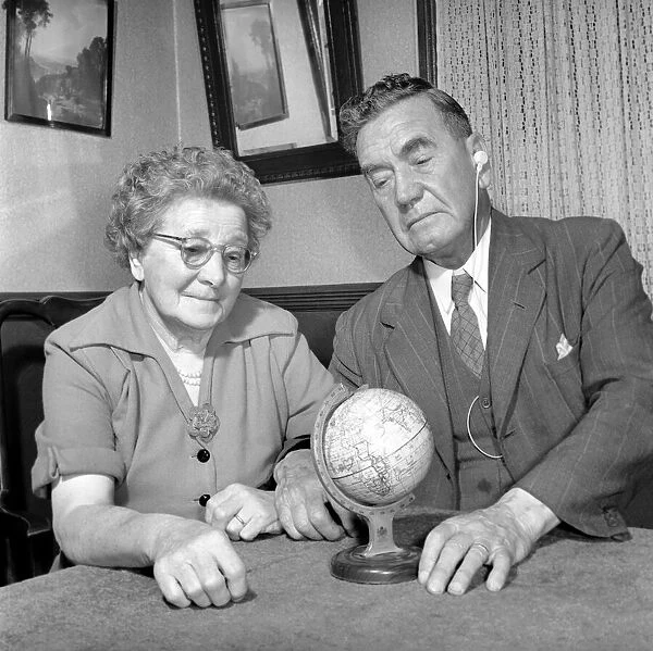 Holidays: Pensioners seen here looking at the globe deciding where to go to for their
