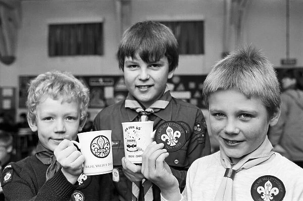 Holme Valley Cubs with commemorative mugs celebrating 65 years of scouting in the Holme
