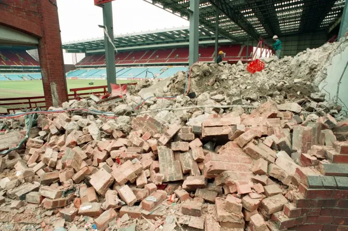 Framed Print : The Holte End stand at Villa Park is demolished by workmen. 10th May 1994 Framed Print : The Holte End stand at Villa Park is demolished by workmen. 10th May 1994