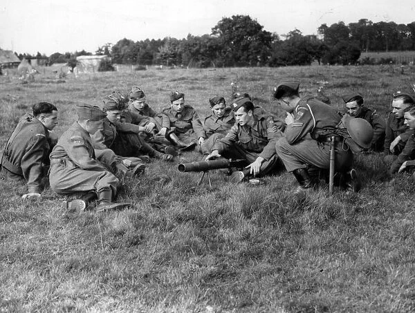 A Home Guard camp near Cardiff, Wales. N. C. O gives a lesson on the Lewis gun