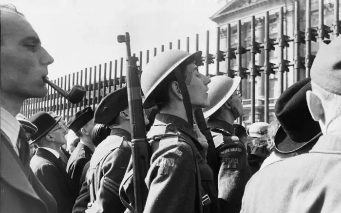 Framed Print : Home Guard outside Buckingham Palace watching the Changing of the Guard ceremony taking Framed Print : Home Guard outside Buckingham Palace watching the Changing of the Guard ceremony taking