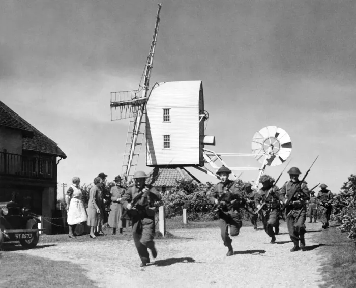 Framed Print : Home Guard volunteers run through a training exercise in the Suffolk village of Framed Print : Home Guard volunteers run through a training exercise in the Suffolk village of