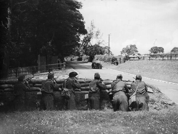 Home Guards, well entrenched, with a bombing post in the background