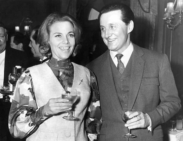 Honor Blackman and Patrick MacNee at a Variety Club luncheon in March 1964