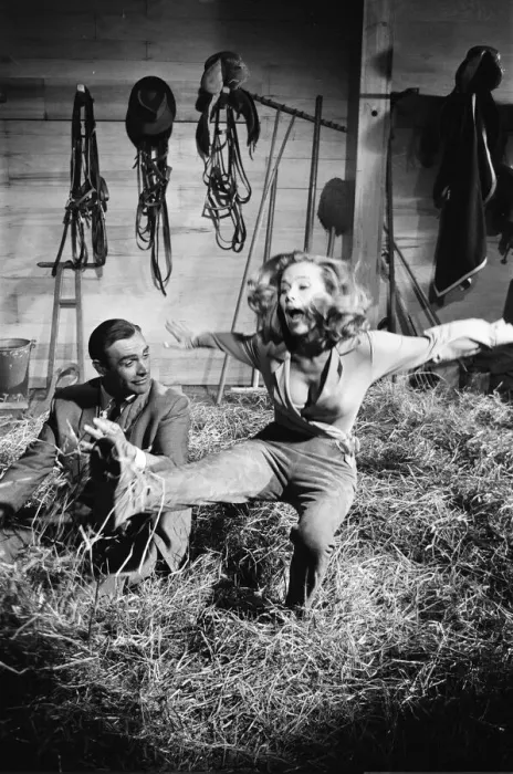 Framed Print : Honor Blackman as Pussy Galore and Sean Connery as James Bond seen here filming a fight