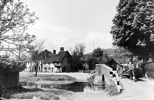 Horse drawn cart crossing the bridge ove the ford at Eynesham, Kent June 1935