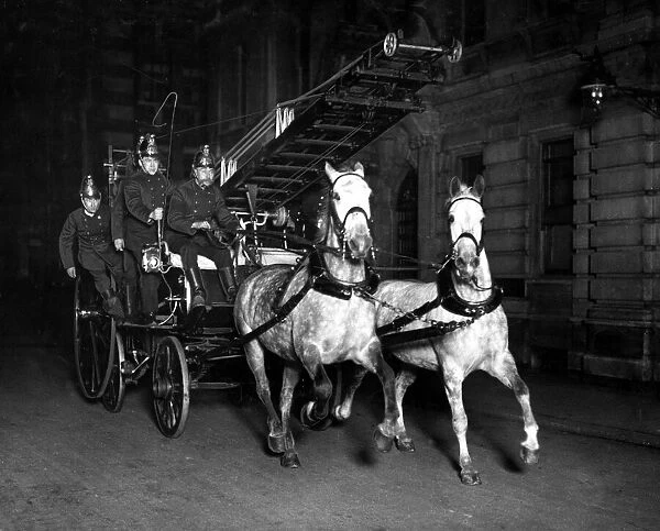 Horse-Drawn Fire Engine with escape ladder. April 1914