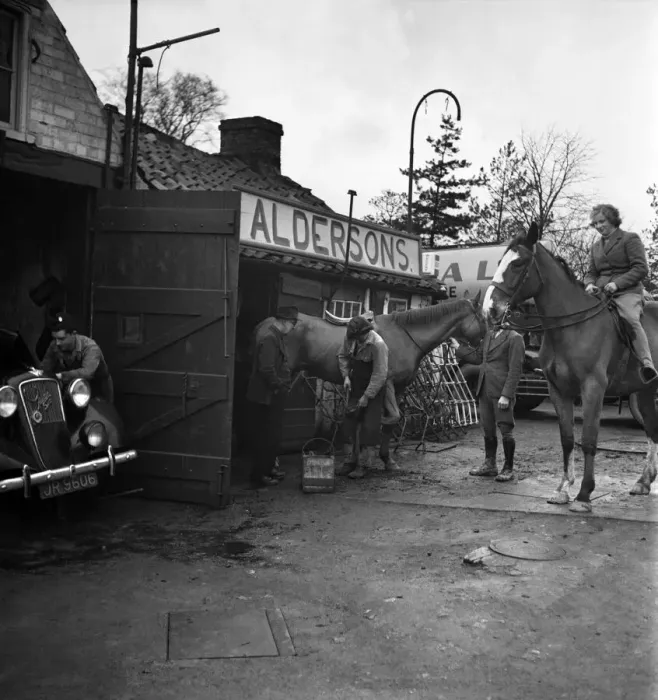 Framed Print : A horse being re-shoed by a blacksmith at his forge January 1948. O22134-001 Framed Print : A horse being re-shoed by a blacksmith at his forge January 1948. O22134-001