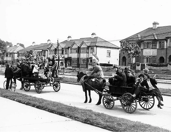 Horses and carts being driven through Southend as part of the WW2 VE Day celebrations
