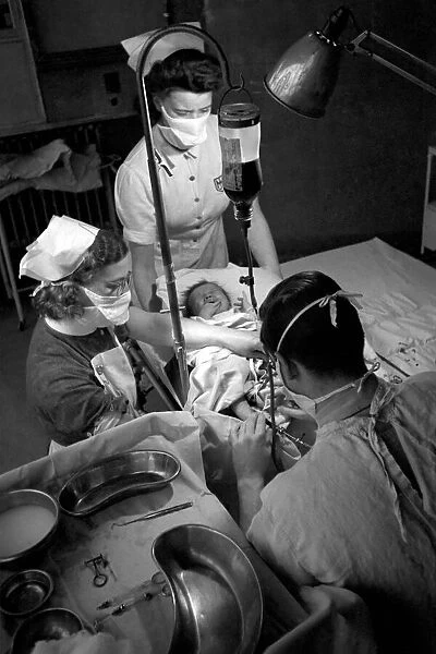 Hospital operation hearts. Babys life saved by blood transfusion. October 1946 O5112-004