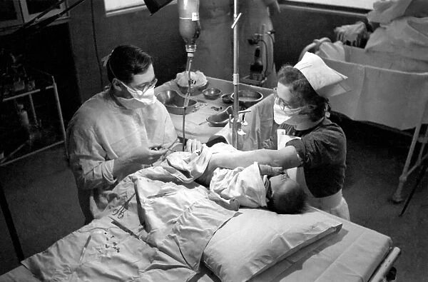 Hospital operation hearts. Babys life saved by blood transfusion. October 1946 O5112-002