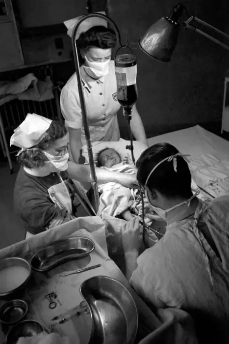 Framed Print : Hospital operation hearts. Babys life saved by blood transfusion. October 1946 O5112-004 Framed Print : Hospital operation hearts. Babys life saved by blood transfusion. October 1946 O5112-004