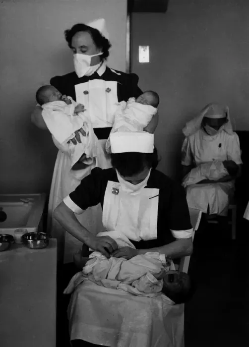 Framed Print : Hospital staff care for four new born babies shorlty after delivery Framed Print : Hospital staff care for four new born babies shorlty after delivery
