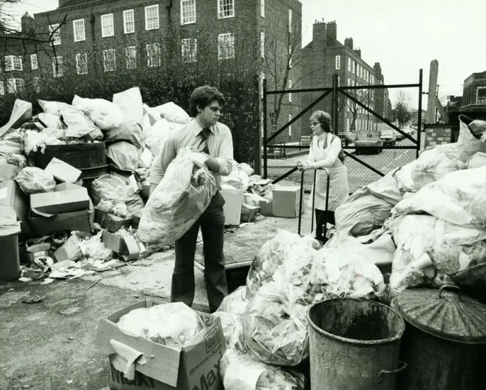 Framed Print : Hospital Staff clear away rubbish at the Queen Elizabeth Childrens Hospital in Hackney
