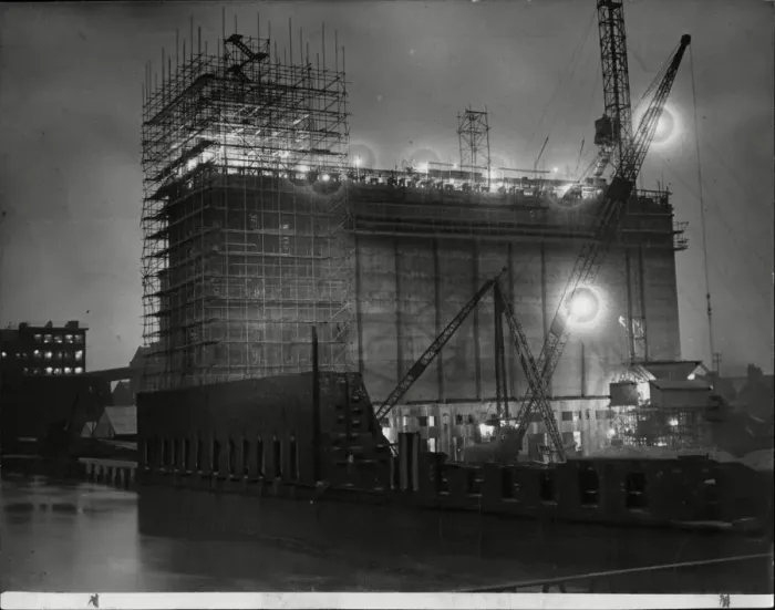 Framed Print : Twenty four hours a day construction continues on the 165ft grain silo at Spillers Ltd Framed Print : Twenty four hours a day construction continues on the 165ft grain silo at Spillers Ltd