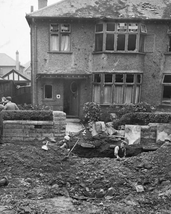 Framed Print : A house in Liverpool, Merseyside, with its windows blown out and damage to the roof