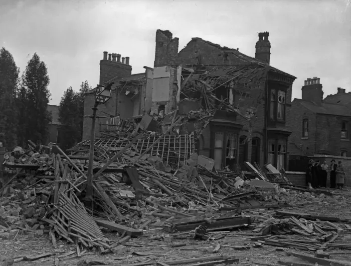 Framed Print : House in Moseley, Birmingham, destroyed during a bombing raid on the city Framed Print : House in Moseley, Birmingham, destroyed during a bombing raid on the city