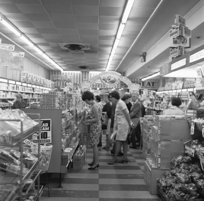 Framed Print : House wives brows the shelves during their weekly shop st the Co-Op supermarket in Framed Print : House wives brows the shelves during their weekly shop st the Co-Op supermarket in