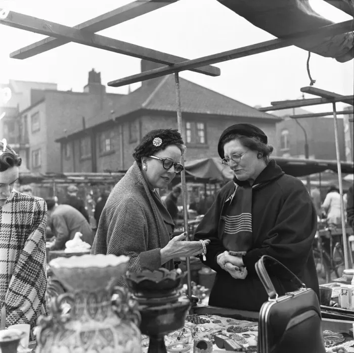 Framed Print : House wives browsing the antique stalls of the New Caledonian Street Market for jewellery Framed Print : House wives browsing the antique stalls of the New Caledonian Street Market for jewellery