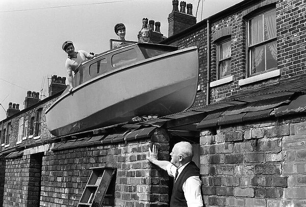 Houseboat, April 1968 Boat on roof for Worthington Family - 8 feet up on roof