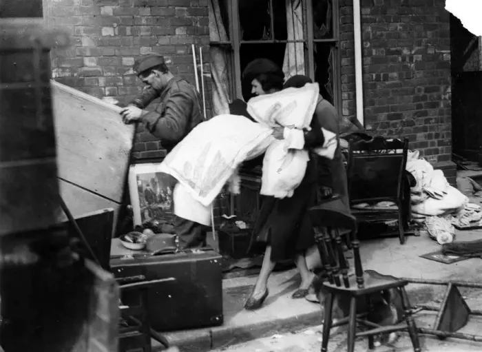 Framed Print : Householders salvage goods from a bombed area in Cardiff following a German air raid