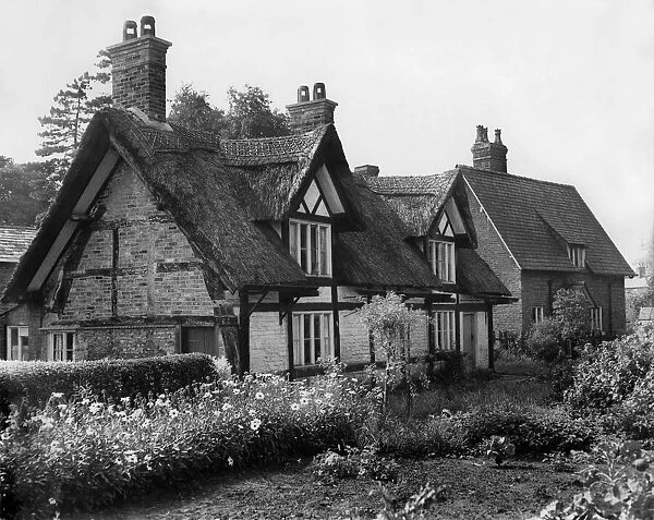 Houses: Cottages: Thatched. A farm lands cottage. September 1955 P008357