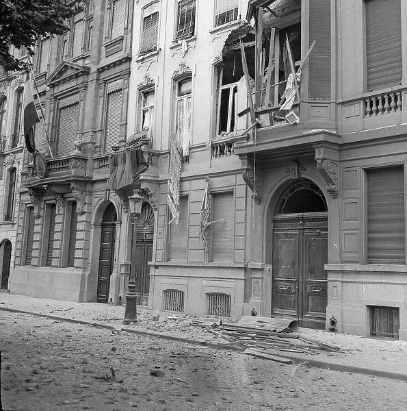 Houses damaged during the German bombardment of the centre of Antwerp. Circa October 1914