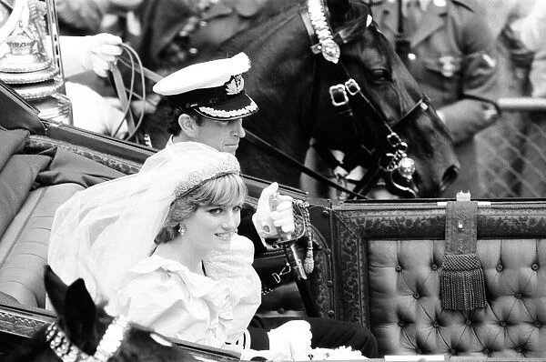 HRH Prince Charles marries Lady Diana Spencer. Picture shows the happy couple