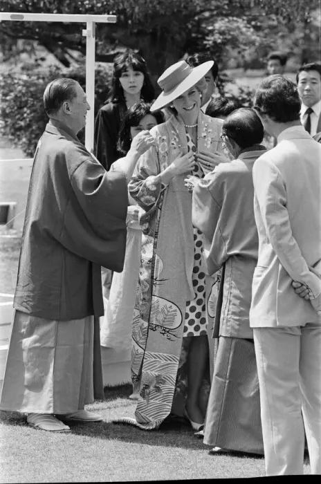 Framed Print : HRH Princess Diana, The Princess of Wales, is helped by city officials to wear a Framed Print : HRH Princess Diana, The Princess of Wales, is helped by city officials to wear a