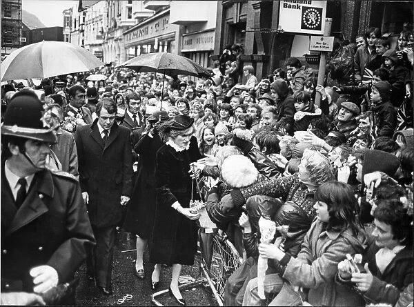 HRH Princess Diana, The Princess of Wales is greeted by a sea of faces on her walk about