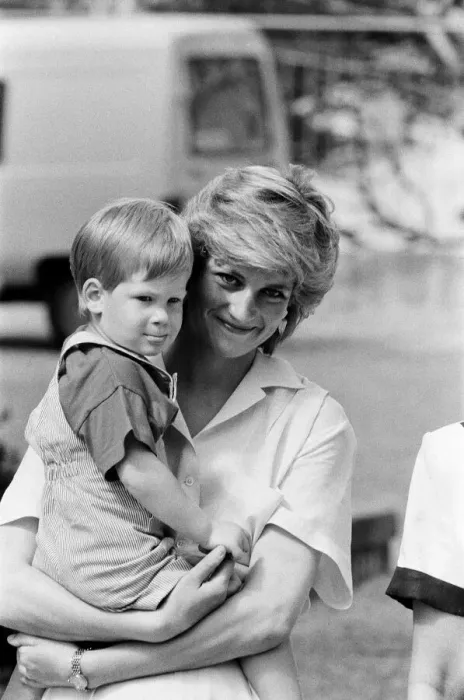 Framed Print : HRH Princess Diana, The Princess of Wales holds her young son Prince Harry on holiday in Framed Print : HRH Princess Diana, The Princess of Wales holds her young son Prince Harry on holiday in